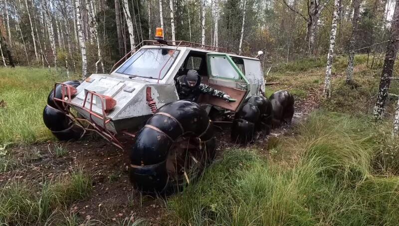 Arctic all-terrain vehicle in Russian forests