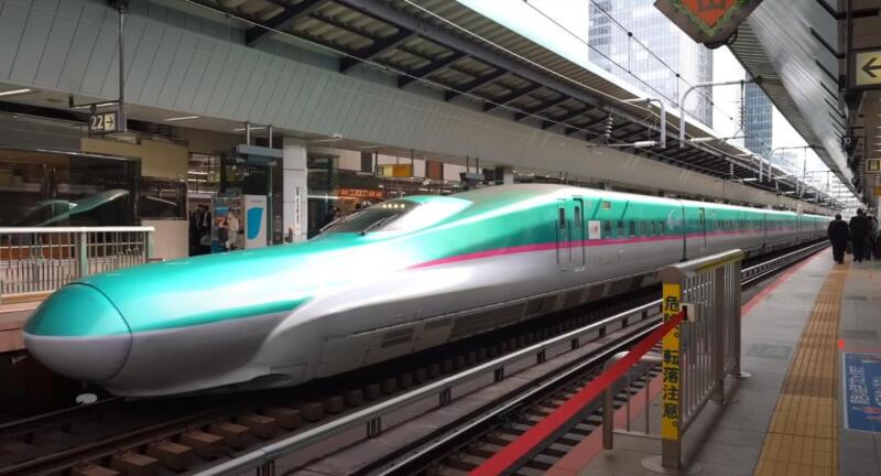 The fastest train in Japan is the Hayabusa train. We're traveling first class
